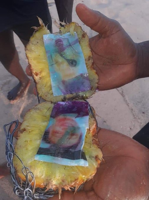Love charm or Voodoo? See pictures of a lady and a guy bound in a pineapple fruit! Photos