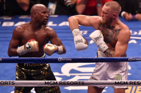OTD in 2017, Floyd Mayweather Jr. defeats MMA fighter Conor McGregor in the 10th round (video)