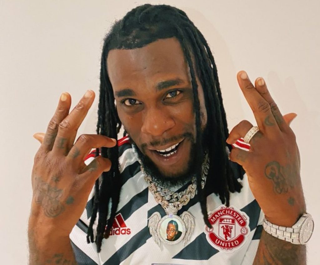 Burnaboy don Manchester United new third kit in style! See pictures 👇