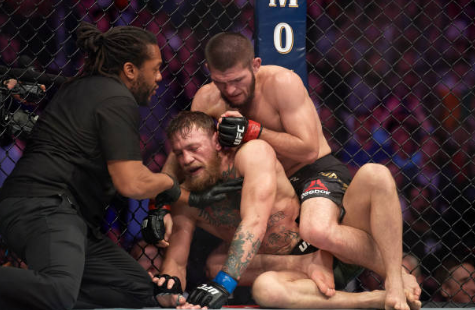 OTD in 2018 Khabib Nurmagomedov beats Conor McGregor by 4th round submission in UFC lightweight title fight (video)