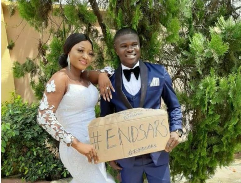 Newly wedded couple use #EndSARS placard in wedding pictures 👇