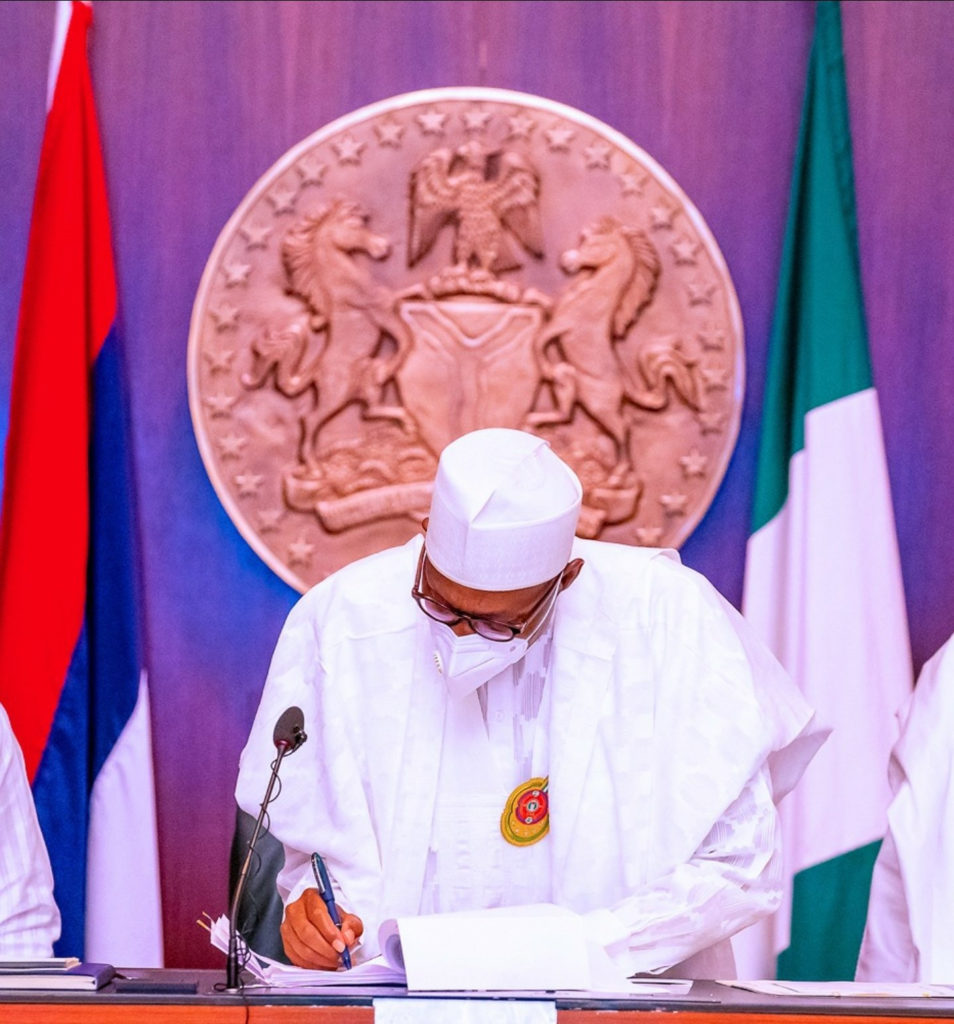 President Buhari signs N13,588,027,886,175 trillion budget for 2021 (photos)