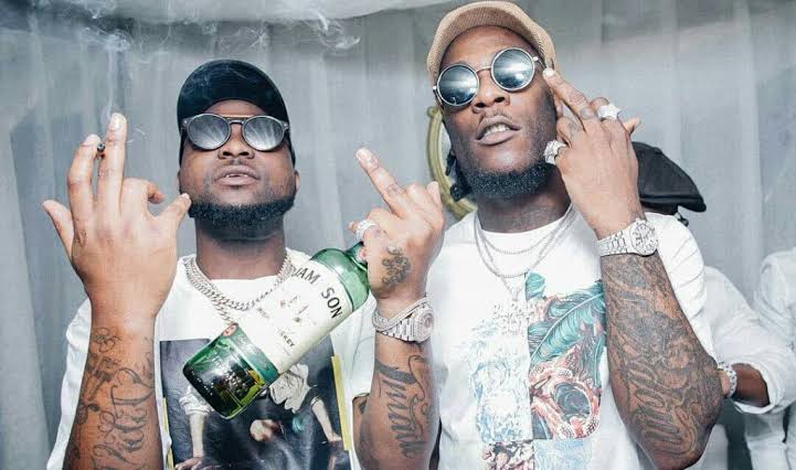 Nigerian Singers, Burna Boy and Davido engage in a fight at a Ghanian night club! See video👇