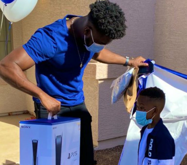 Nigerian man buys PlayStation 5 for son after surviving cancer twice before his 6th birthday! Pictures 👇
