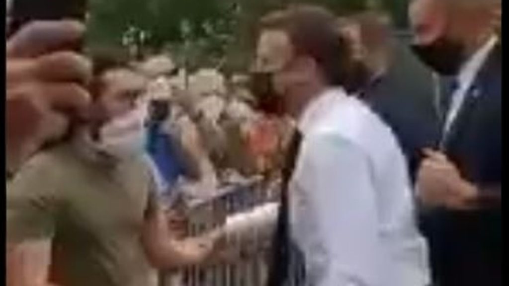 Watch French President Emmanuel Macron slapped by stranger (video)