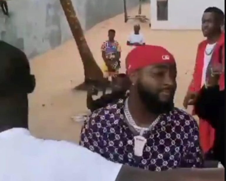 Watch as Davido holds impromptu concert for children as Lagos beach! Video