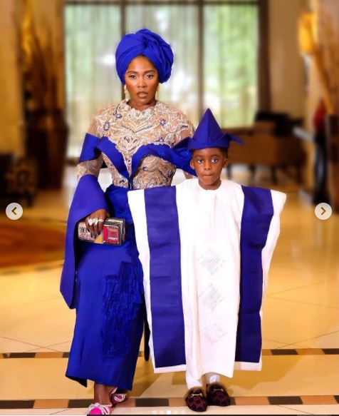 Tiwa Savage and son Jamil rock matching outfit at her father’s burial (photos)