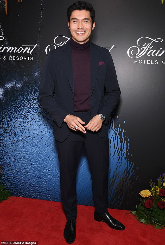Henry Golding is dashing as ever in suit-turtleneck combo for Fairmont event at The Plaza
