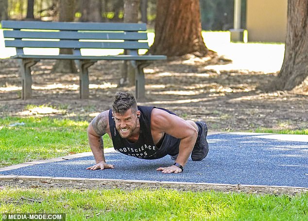 Muscular Dan Ewing endures gruelling workout at Sydney park after being dumped from SAS Australia