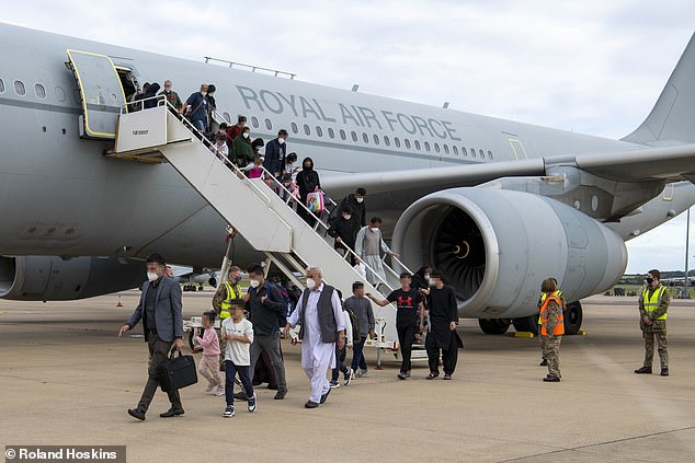 Afghan translators and families forced to flee across borders are finally whisked to safety 1