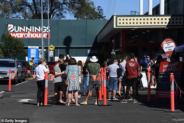 Covid-19 Australia: Hundreds of Queenslanders gather for a Bunnings sausage amid jab rollout 1