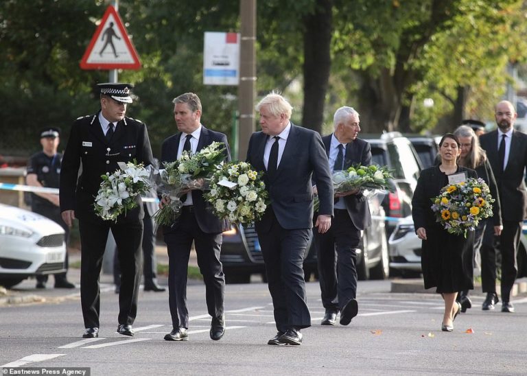 Boris Johnson and Keir Starmer lay flowers at David Amess murder scene in show of unity