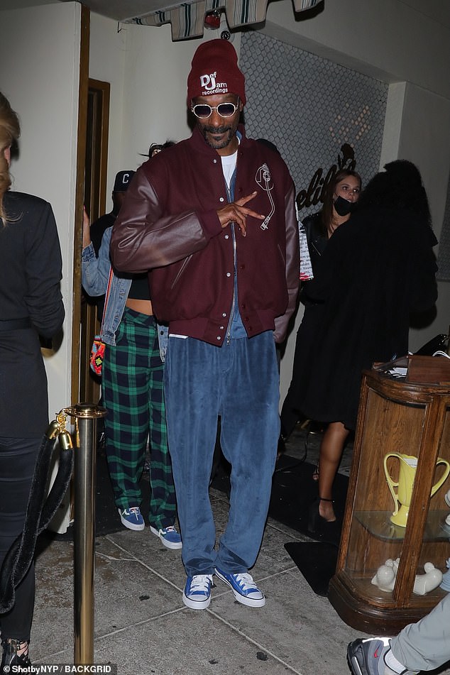 Snoop Dogg is the picture of cool while at celebrity hotspot Delilah in West Hollywood