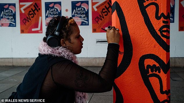 Bungling cleaners wash away murals by three young female illustrators after art mistaken as graffiti