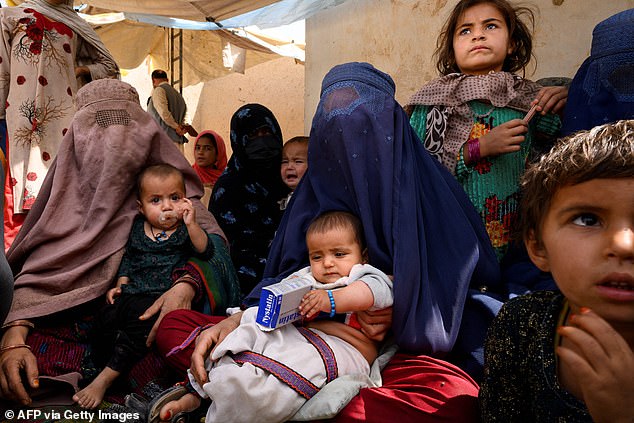 Destitute Afghan families ‘are selling their CHILDREN to make ends meet’ amid collapsing economy