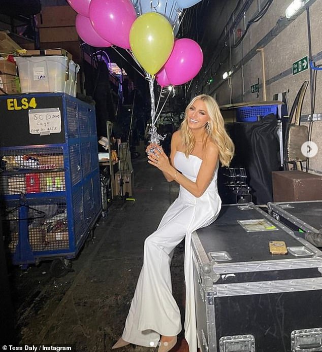Tess Daly is a vision in strapless white jumpsuit as she hosts Strictly Come Dancing elimination