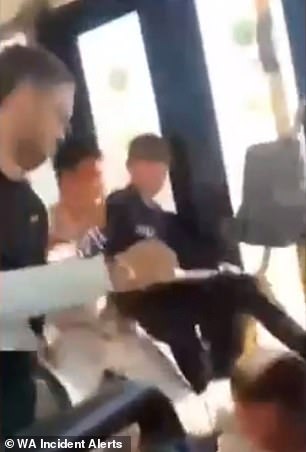 Horrifying moment group of teens violently bash a father on a bus as his terrified child watches on
