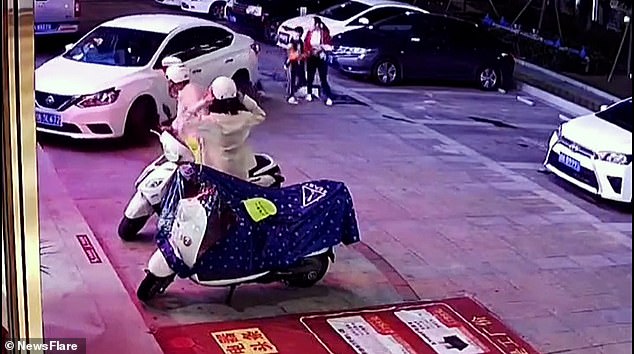 Chinese mother saves her son from death in car park incident