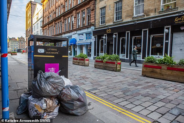 Bin collectors in Glasgow plan strike that could turn city into ‘dump’ during Cop26 climate summit