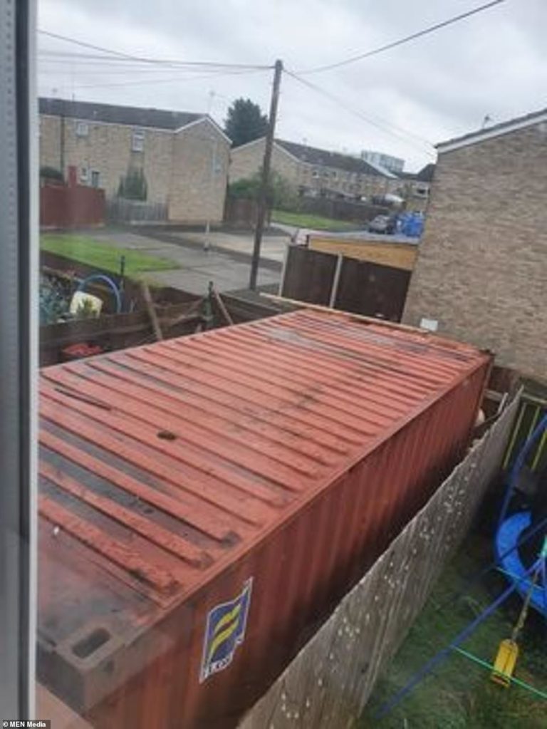 Mother-of-four’s fury as neighbour plants shipping container with smoke-billowing chimney in garden