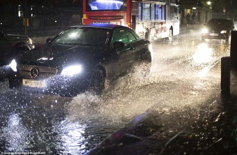 Southern Britain is battered by up to three inches of rain and 45mph gales
