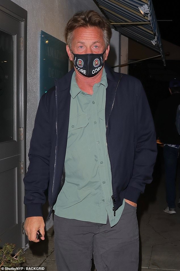 Sean Penn masks up while stepping out for a solo dinner in Santa Monica