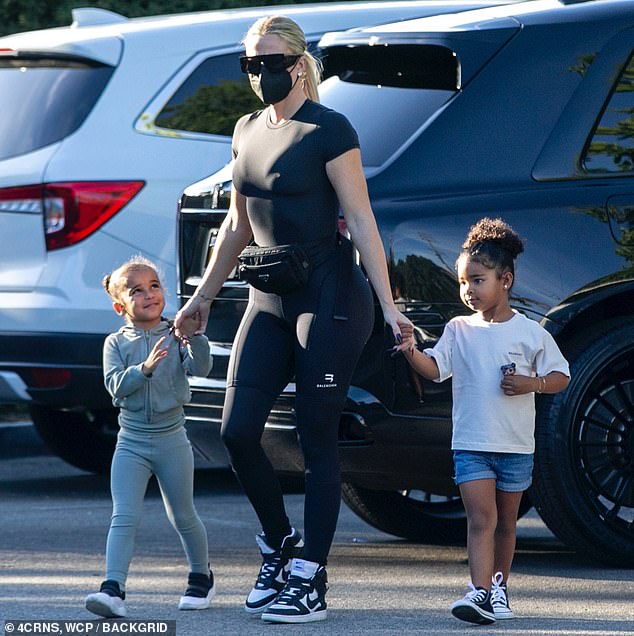 Khloe Kardashian shows off famed derriere in spandex while out with daughter True and niece Dream