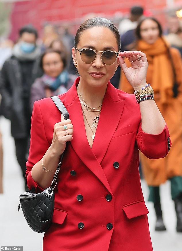 Myleene Klass means business in a stunning red suit  