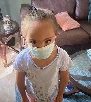 Furious father says Florida school TIED mask to his nonverbal seven-year-old daughter 1