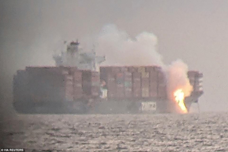 Cargo ship catches fire after dozens of shipping containers fell off 1