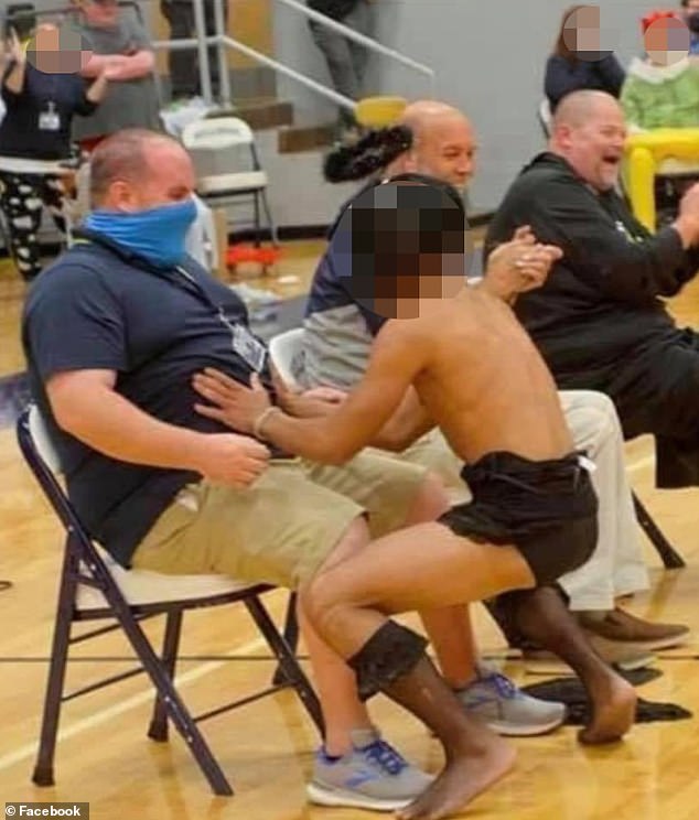 Kentucky high school is investigated after students are seen giving teachers LAP DANCES