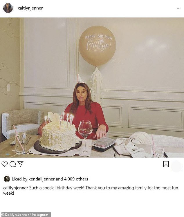 Caitlyn Jenner poses by herself with a cake as she turns 72 and thanks her ‘amazing’ family