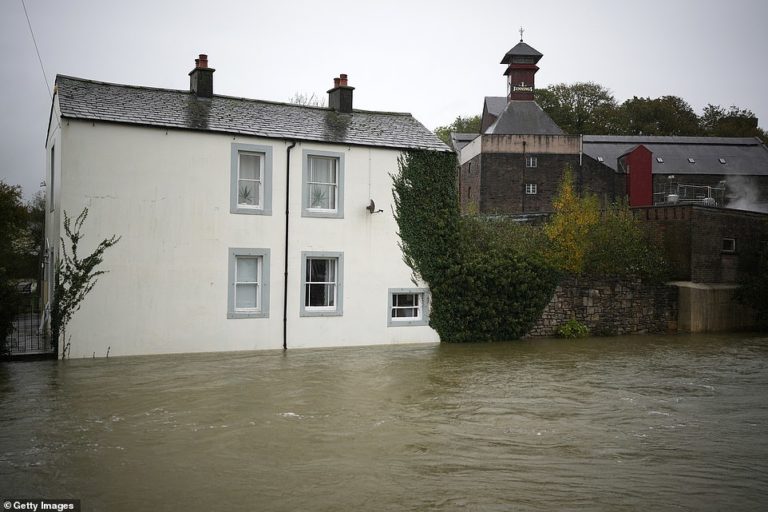 Britain told to brace for floods with over an inch of rain set to fall in the northwest