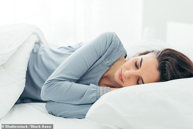 Britons enjoy an extra hour in bed as clocks go back one hour to GMT