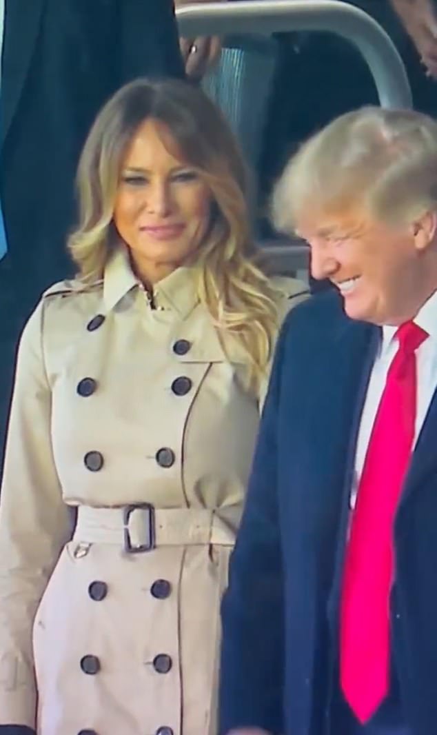 Not impressed! Melania Trump drops her smile as she turns away from Donald at Braves game