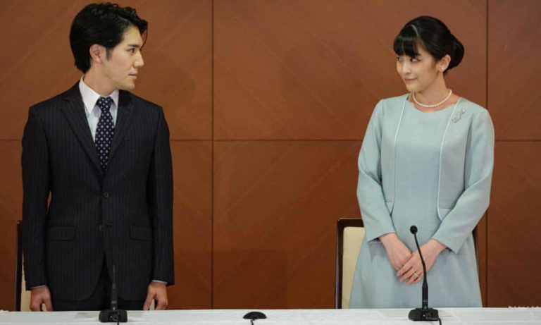 Japan’s Princess Mako weds in a simple ceremony but loses royal status