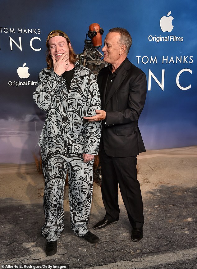 Tom Hanks reunites with Caleb Landry Jones at the LA premiere of their Apple TV+ film Finch