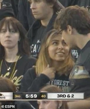 College football fan SNUBS his girlfriend’s kiss on national TV, calls it an ‘inside joke’