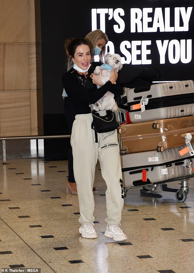 Married at First Sight’s KC Osborne covers her famous curves in sweats at Sydney airport