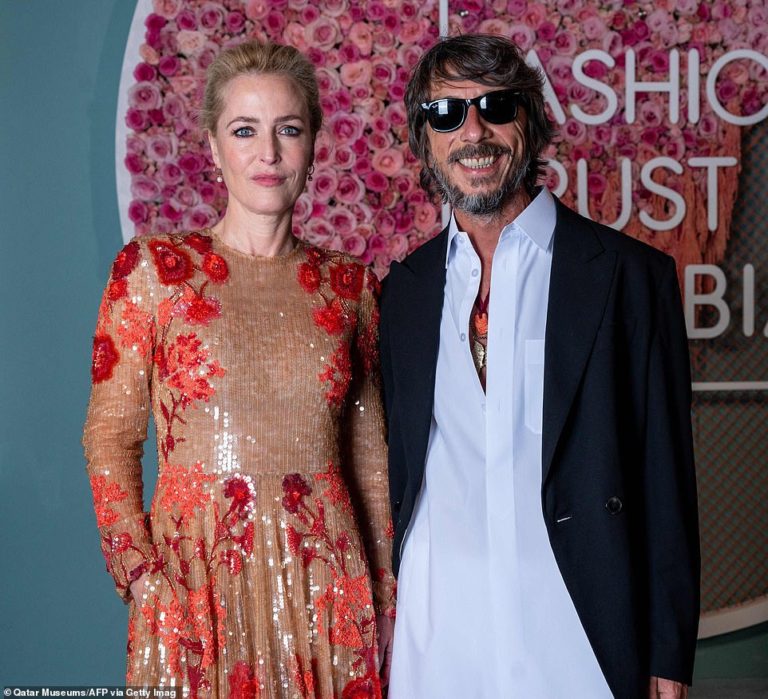 Gillian Anderson dazzles in a sequin floral gown at the Fashion Trust Arabia Awards in Qatar