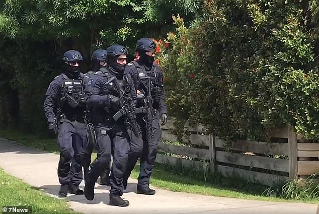 Manhunt underway after shots fired at police in Melbourne  