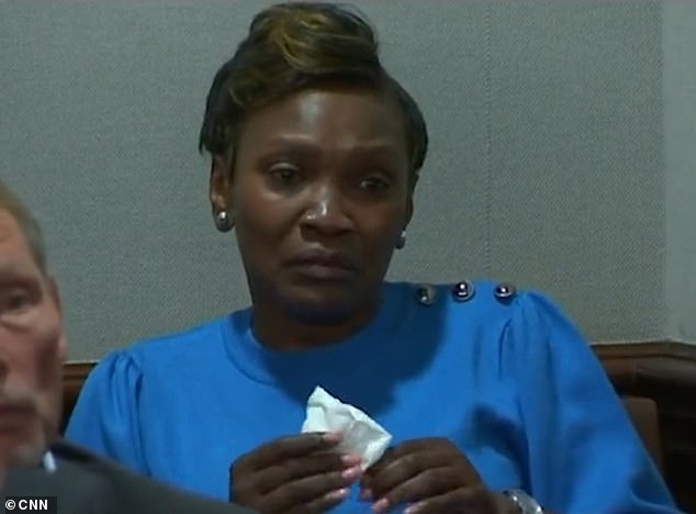 Ahmaud Arbery’s mother sobs as video of the black jogger’s killing is played at his murder trial