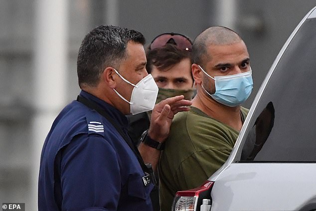 Fugitive Mostafa Baluch lands back in Sydney after being extradited from Queensland