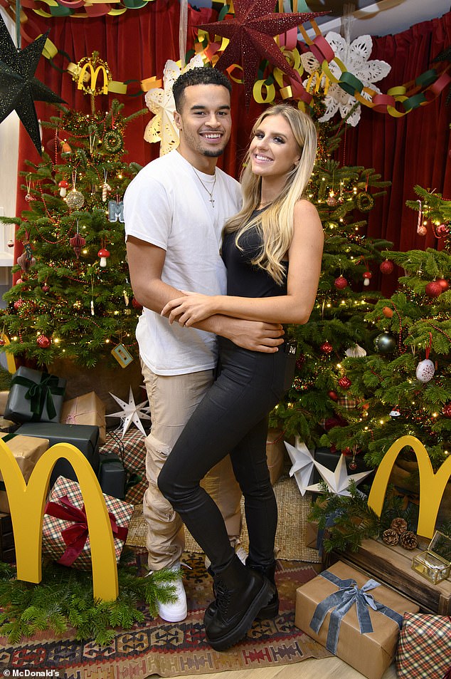 Toby Aromolaran and Chloe Burrows pack on the PDA at McDonald’s Christmas advert launch