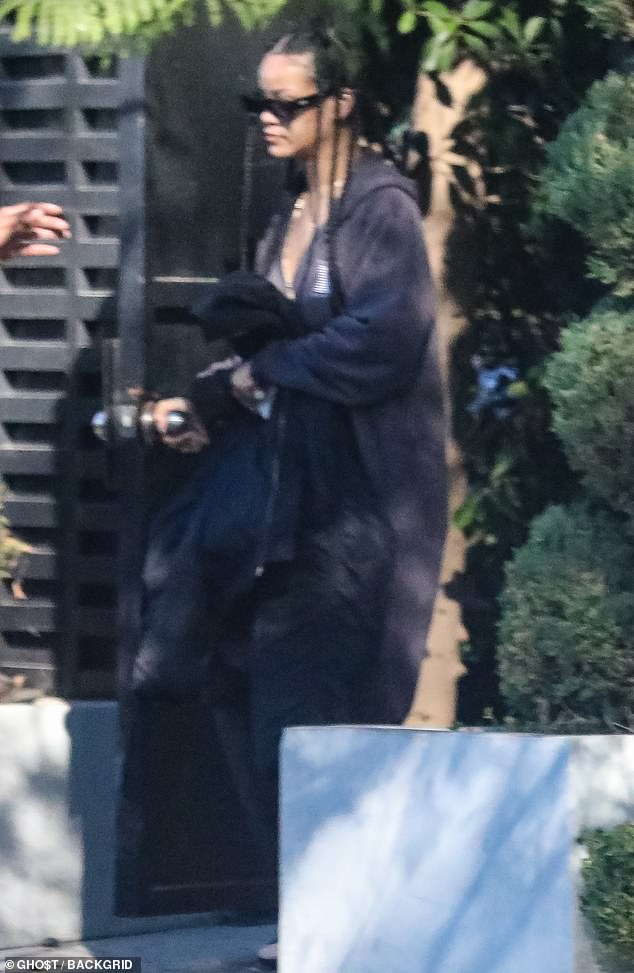 Rihanna goes California casual in cozy hoodie jumpsuit as she leaves boyfriend A$AP Rocky’s home