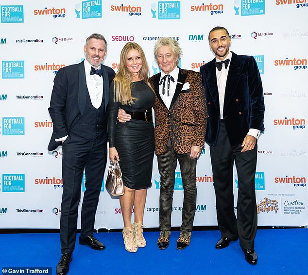 Sir Rod Stewart, 76, dons a leopard print blazer as he performs at Football For Change