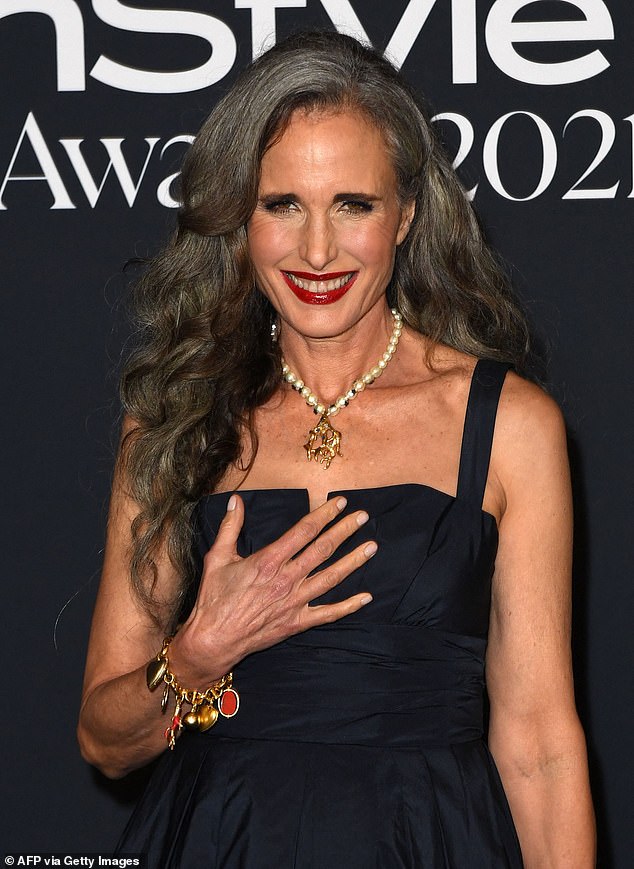 Andie MacDowell, 63, styles her natural grey hair into glamorous curls for the InStyle Awards in LA