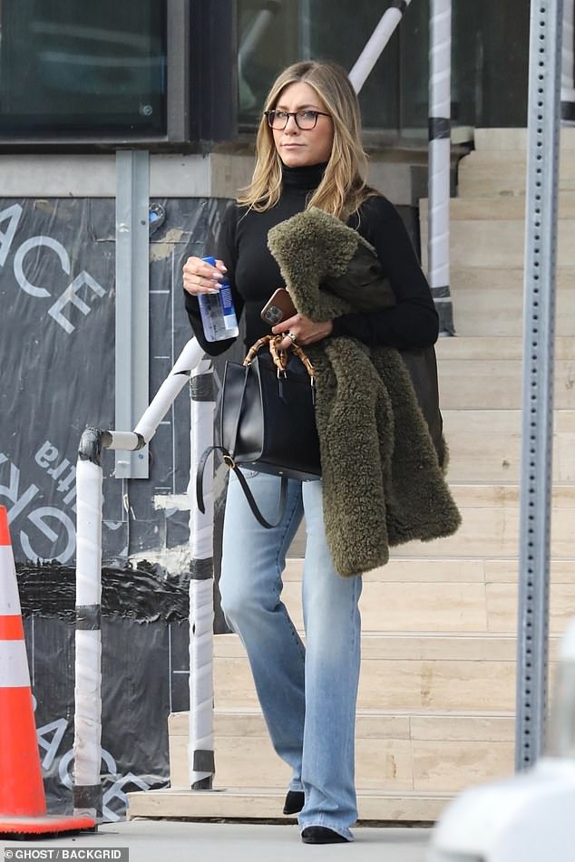 Jennifer Aniston, 52, looks fresh-faced in turtleneck and jeans on outing in West Hollywood