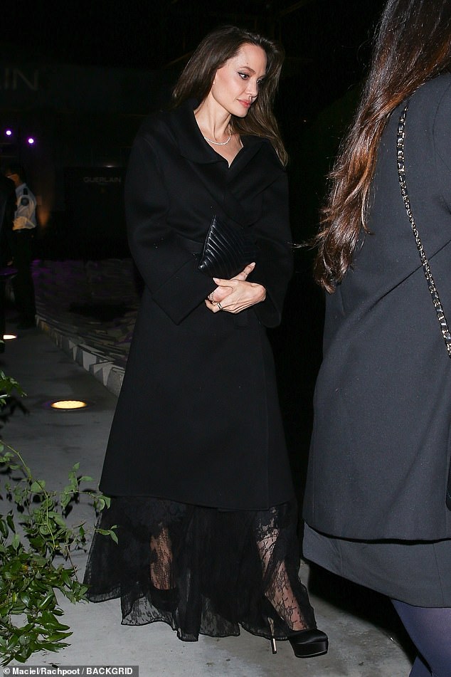 Angelina Jolie exudes sophistication in head-to-toe black as she attends a Guerlain event in LA