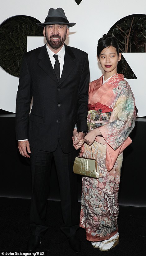 Nicolas Cage, 57, hits the red carpet with wife Riko Shibata, 26, at 2021 GQ Men of the Year Party